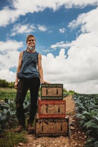 emma w boxes in field (3)